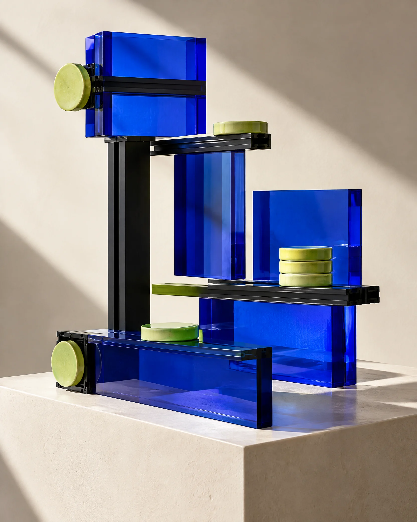 Abstract physical system components on a plinth
